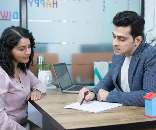 man-woman-are-sitting-table-with-laptop